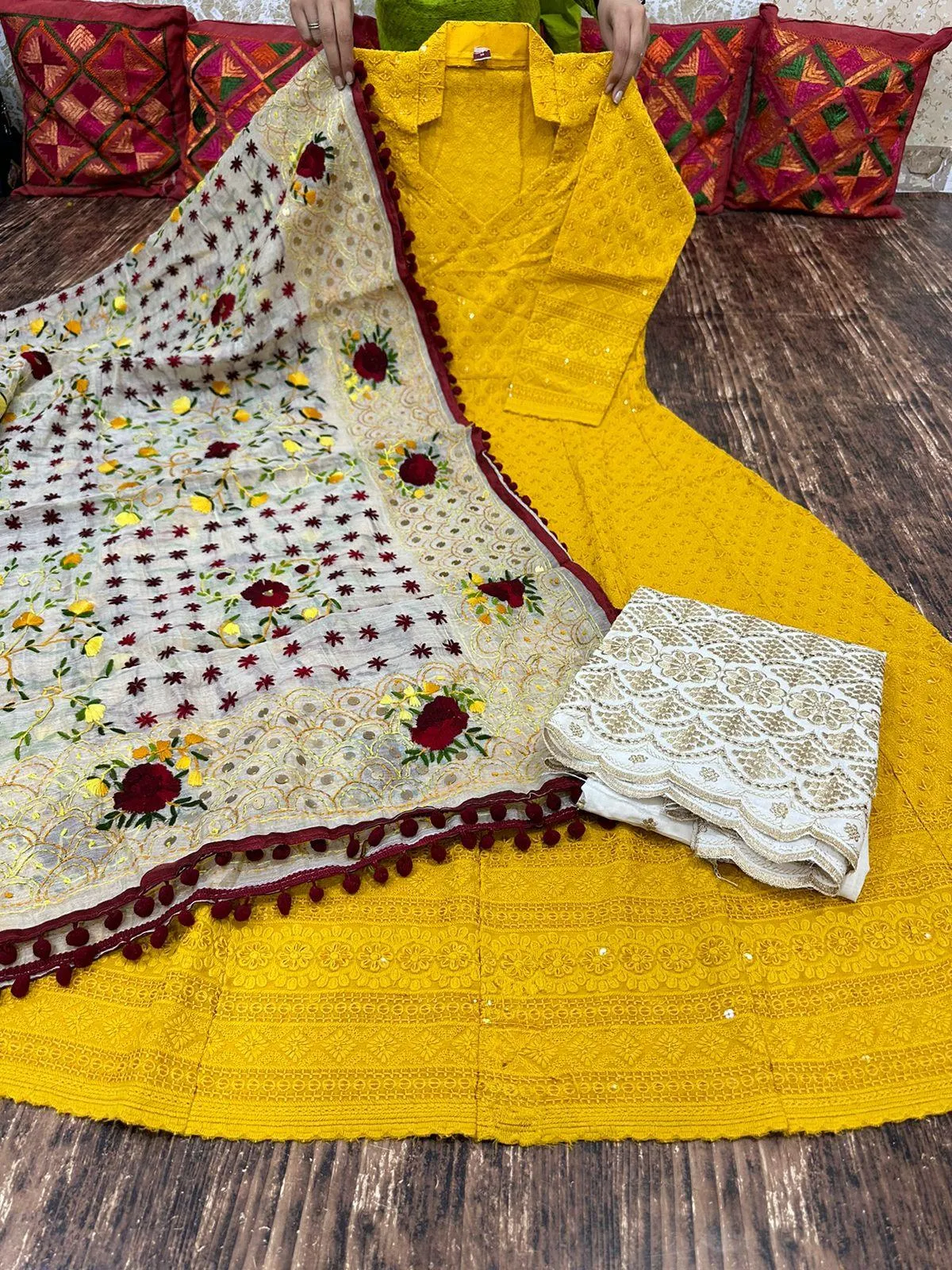Radiant Yellow Anarkali Set with Playful Pom Pom Dupatta Adorned with Sequence Work and Zari-Embroidered Chikan Palazzo.