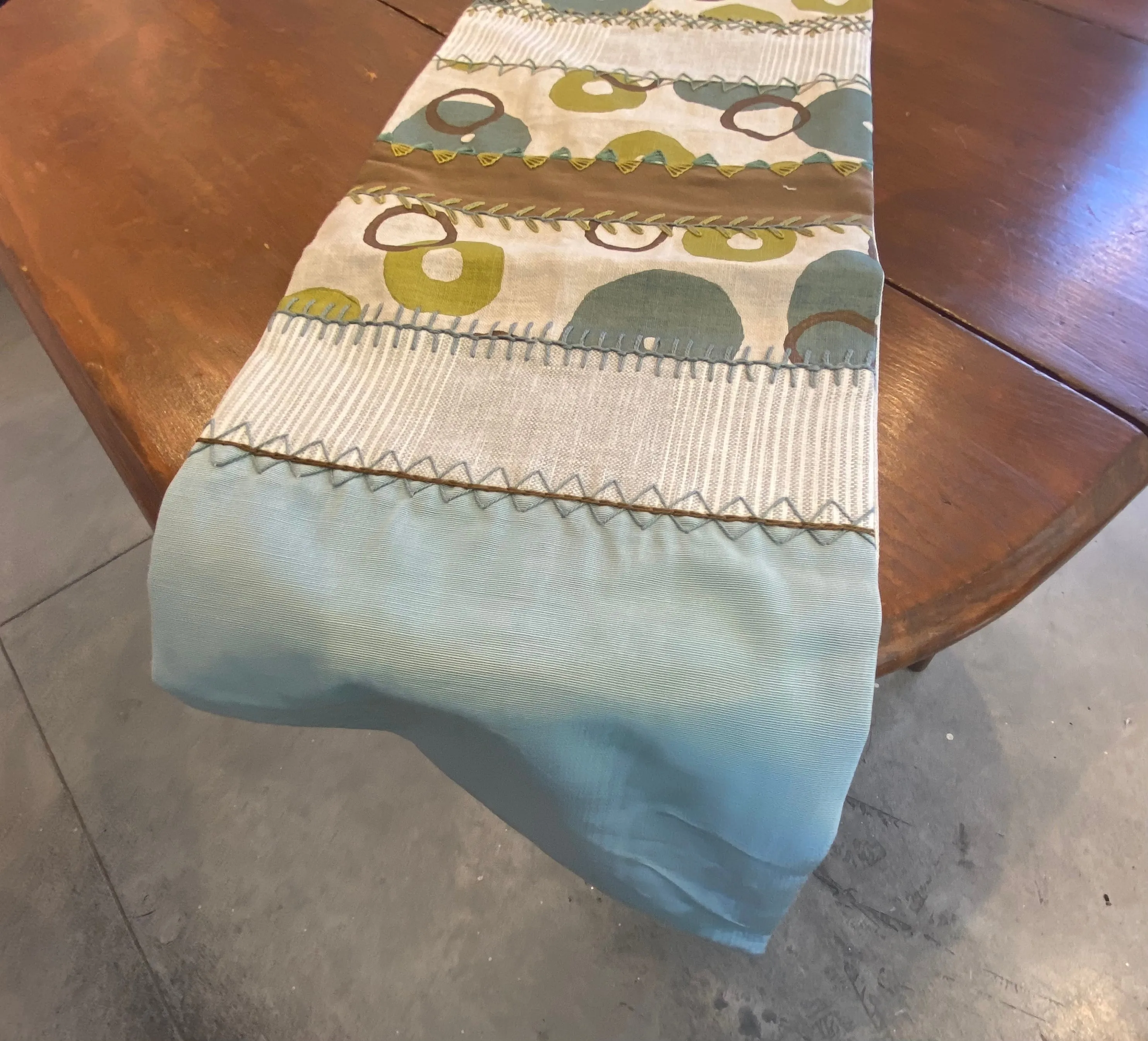 Sonata Design Embroidered Table Runner on ecru